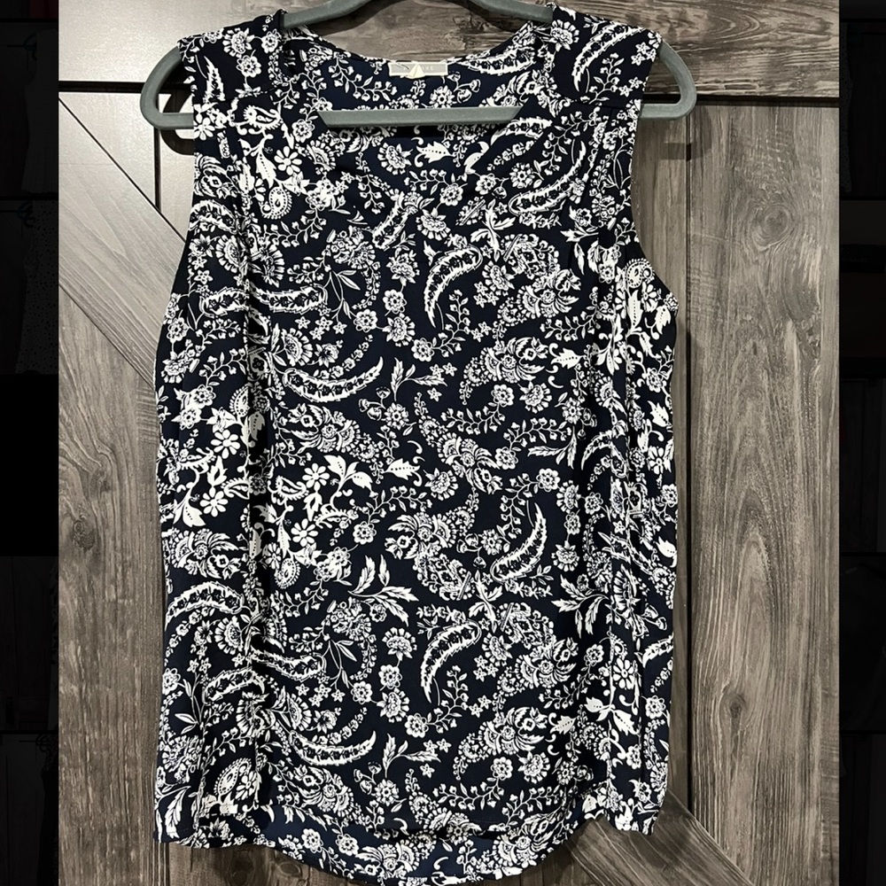 Navy and white floral V Neck top, size S (but fits more like a traditional M)